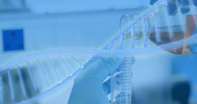 Dna structure spinning against health worker working in laboratory