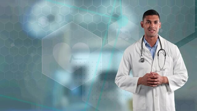 Male doctor talking looking at the camera against medical icons on green background
