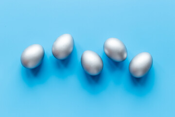 Silver Easter eggs. Easter decoration, top view