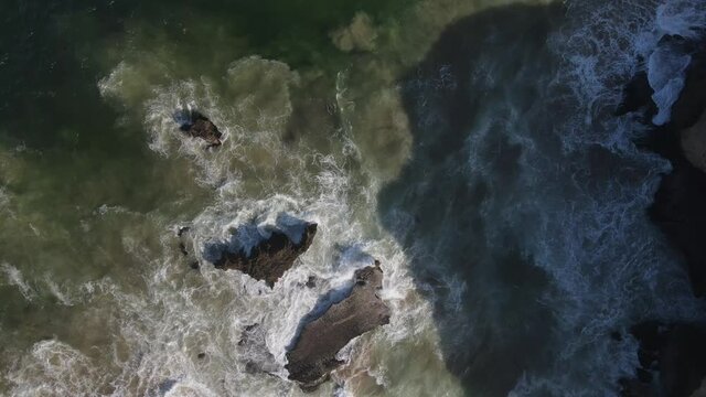 Cliff, waves, coast video shots taken by drone 4K
