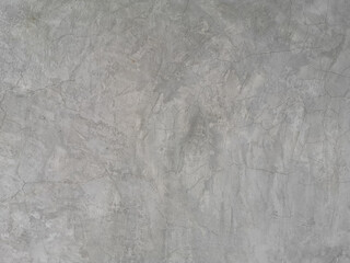 crack on cement wall bare polished grey color and smooth surface texture concrete material vintage background detail architect construction brick walls plastered and painted