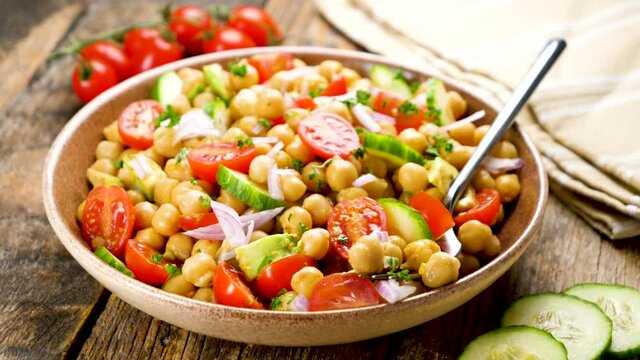 chickpea salad with avocado, cucumber and tomato