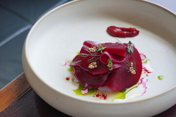 Three way organic highland beetroot tartare; roasted whole, salad with native dragon fruit and highland herbs.                    