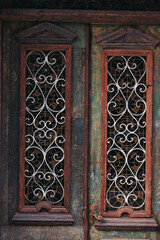 old wooden window with shutters in Tbilisi