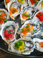 International Buffet - Raw oyster with tobiko