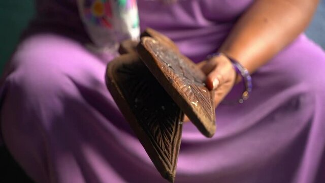 Woman making thekua for chhath puja