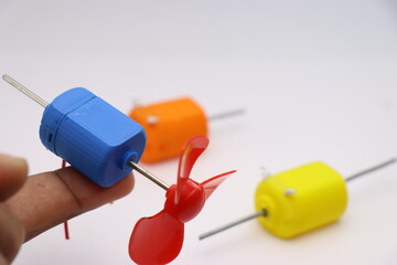 Naklejka premium 3D Printed Toy Dc Motor with Double Shaft. Two shaft motor having shaft at either sides