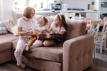 Beautiful portrait of a family with a disabled child. Happy family with a kid cerebral palsy....