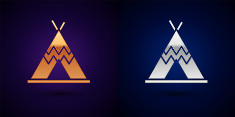 Gold and silver Traditional indian teepee or wigwam icon isolated on black background. Indian tent. Vector © Oksana
