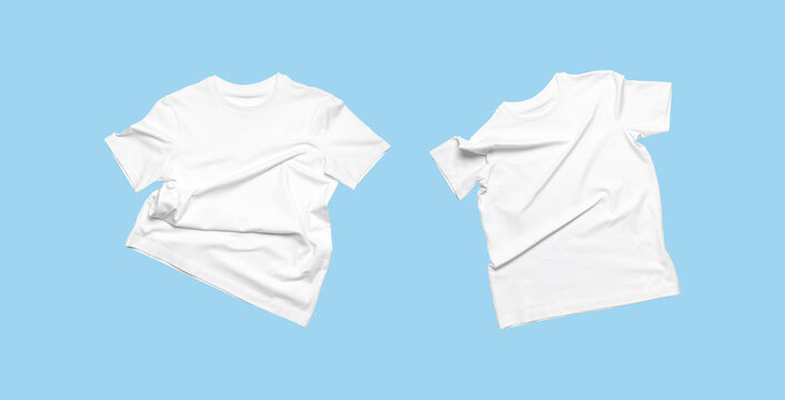 White flying cotton T-shirt isolated on blue background. Clean white t-shirt  for women or men. Classic Basic Unisex T-shirt. Branding clothes front view  Mock up for your design Photos | Adobe Stock