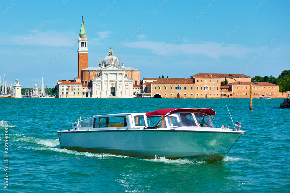 Wall mural Water taxi in Venice