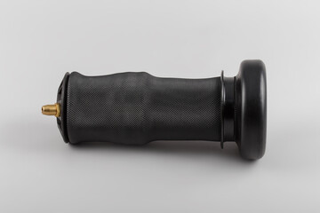 Trucks Cabin Shock Absorber, New auto parts, spare parts Cabinedemper. Shock absorber on a gray background...