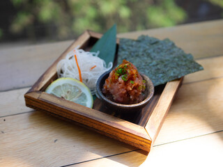 Japanese Menu - Raw Meat Yukke with sauce and salmon ikura