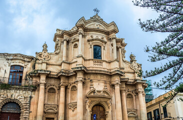 Fototapeta na wymiar Frontage of St Dominic Church in historic part of Noto city, Sicily in Italy