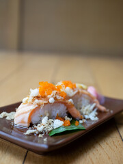 Japanese Menu - Salmon Nigiri on the Japanese style plate