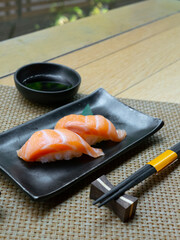 Japanese Menu - Salmon Nigiri on the Japanese style plate