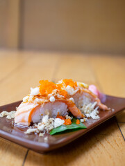 Japanese Menu - Salmon Nigiri on the Japanese style plate