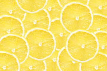Yellow lemon slices background. Fruit pattern. Cut slices color texture. Lemon fruit section...