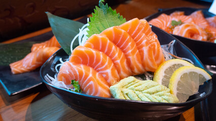 Japanese Menu - Salmon Sashimi served with wasabi and lemon