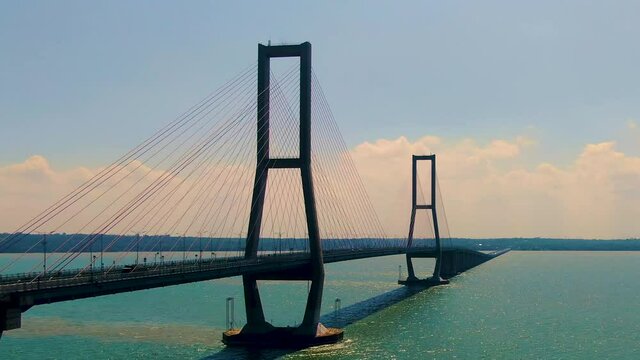 Suramadu Bridge between turquoise ocean and blue sky, Java, Indonesia
