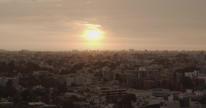 Lima cityscape and skyline during sunset - Timelapse