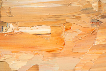Embossed pasty oil paints and reliefs. Primary colors: ocher, brown, orange.  Abstract art.