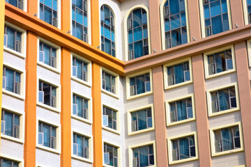 Fototapeta na wymiar Colorful building facade and windows