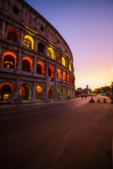 Fototapeta na wymiar Exterior view of Colosseum at dusk in Rome city