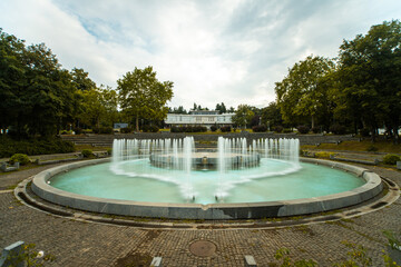 Exterior of Museum of Yugoslavia with fountain in foreground in Belgrade city