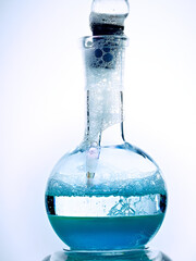 Glass flask with a chemical reagent.