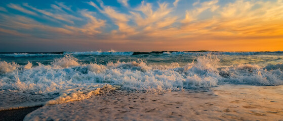 Sunset seascape along the sandy beach of Yzerfontein, Western Cape