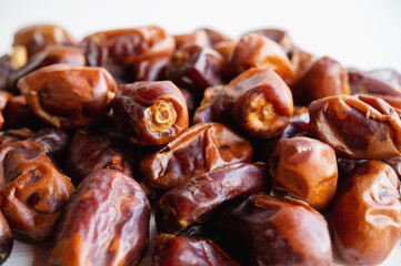 Dried dates, food background. Close-up of dates on a horizontal background
