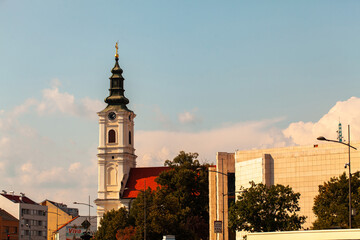 View of clock tower of orthodox church in Novi Sad city