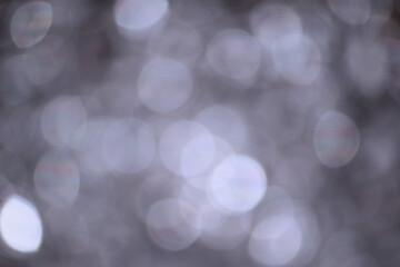 Obraz premium Silver bokeh blured background glitter blur celebration happy new year 2021 2022 and 2023 christmas bright white lights on the dark background