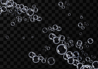 Round transparent clean realistic soap bubbles on a transparent abstract background. Vector