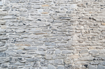 Texture of a stone wall. Old castle stone wall texture background. Part of a stone wall, for background or texture