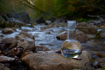 Clean drinking water. Flask with water.