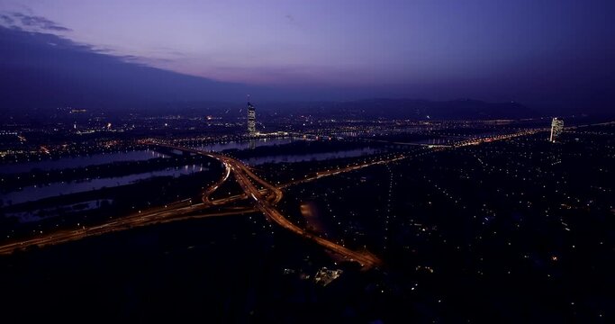 Timelapse shot of a highway underpass at night.