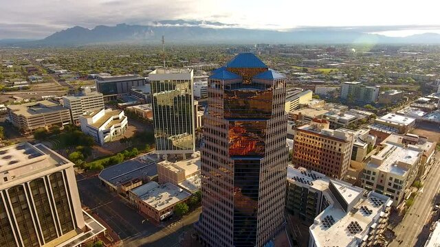 Cinematic drone shot of downtown Tucson Arizona and surrounding urban sprawl