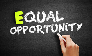 Fototapeta premium Equal opportunity text on blackboard, concept background