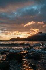 Sunset on rocky beach