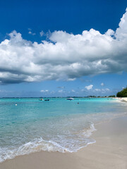 Tropical beach, Caribbean Sea. White Sands on cloudy day. Crystal water
