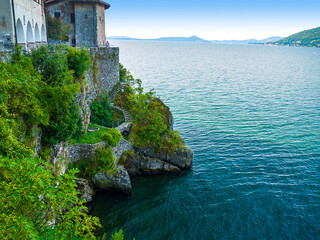 Fototapeta na wymiar The Hermitage Church of Saint Catherine of Alexandria in the cliffs on the shore of Lake Maggiore in Northern Italy