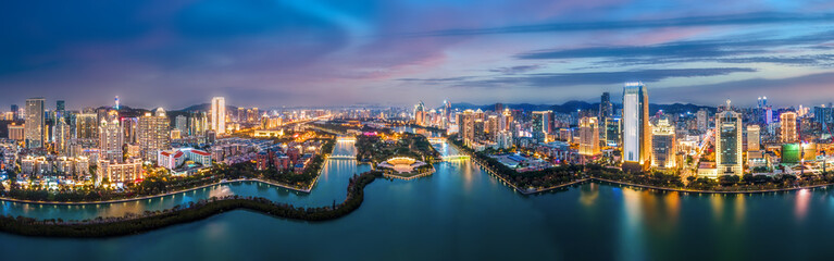 Aerial photography of the modern city landscape night view of Xiamen, China