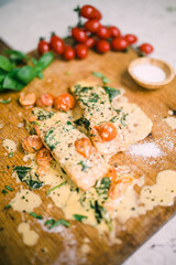 Savory Salmon Meal with Alfredo Sauce and Tomatoes 