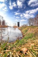 WROCLAW, POLAND - FEBRUARY 22, 2021: Frozen lake landscape. The Milicz Ponds (Polish: Stawy...