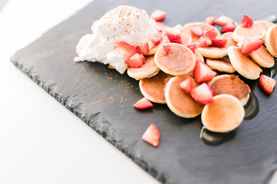 Homemade Strawberry Pancakes with Whipped Cream 