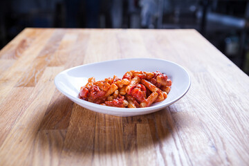 Rigatoni paste in tomato sauce with onion and vegetable. Red sos Penne pasta. Fresh food. Fres italian dish. Italian kitchen.