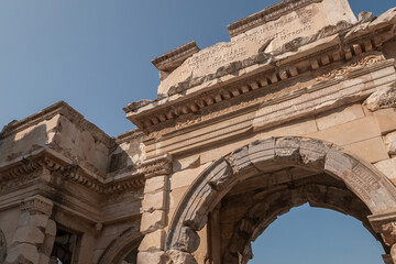 Gate of Mazeus and Mithridates of ancient city of Ephesus, Izmir, Turkey. Elegant details of ancient marble buildings.