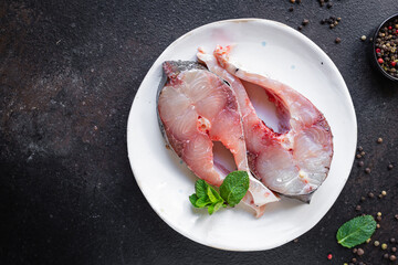 fish steak raw silver carp ready to cook snack healthy vegetarianmeal top view copy space food background rustic image pescetarian diet 